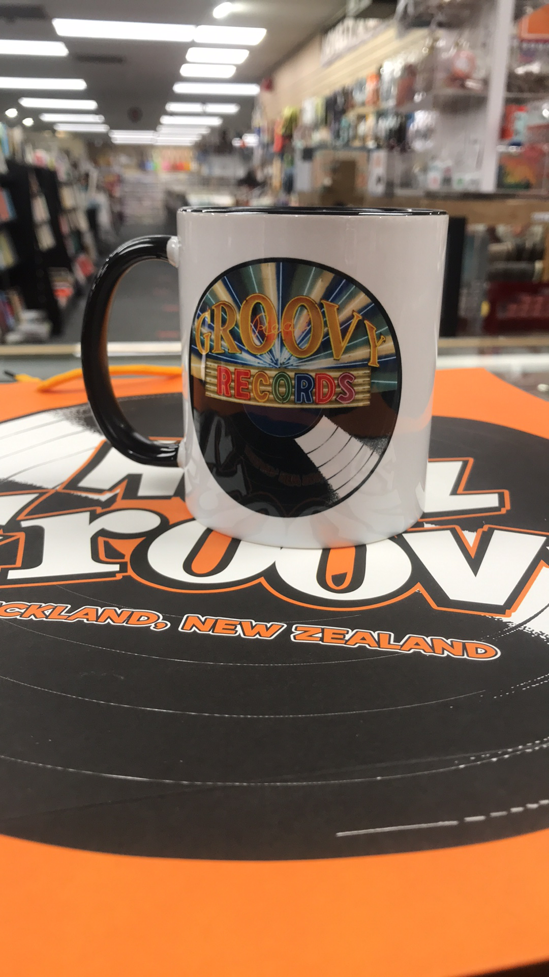 Real Groovy Coffee Mug Neon Record Sign Black